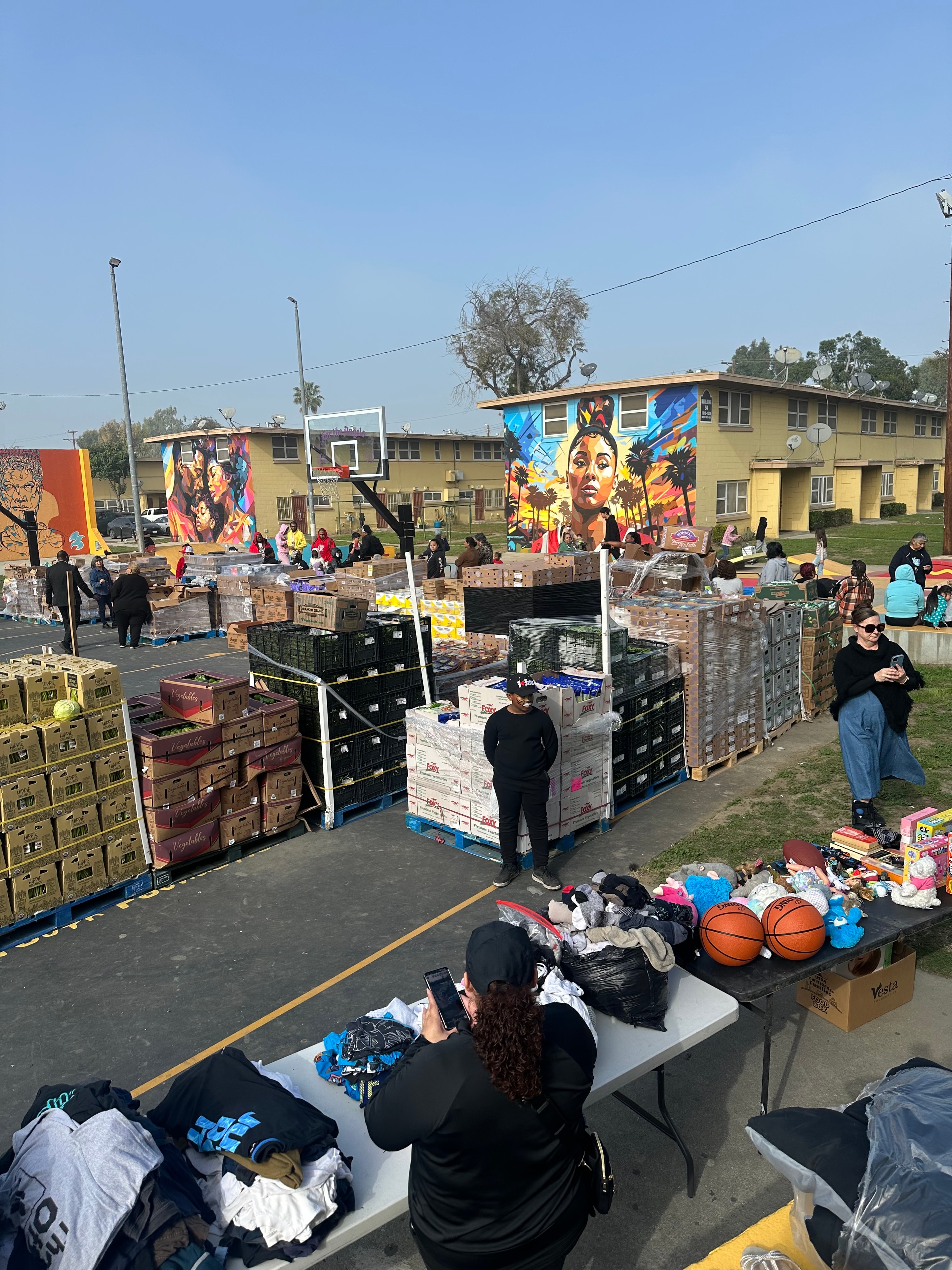 Community outdoor event with donations and neighbors coming together
